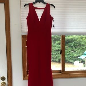 Beautiful red floor length dress ! Never worn .